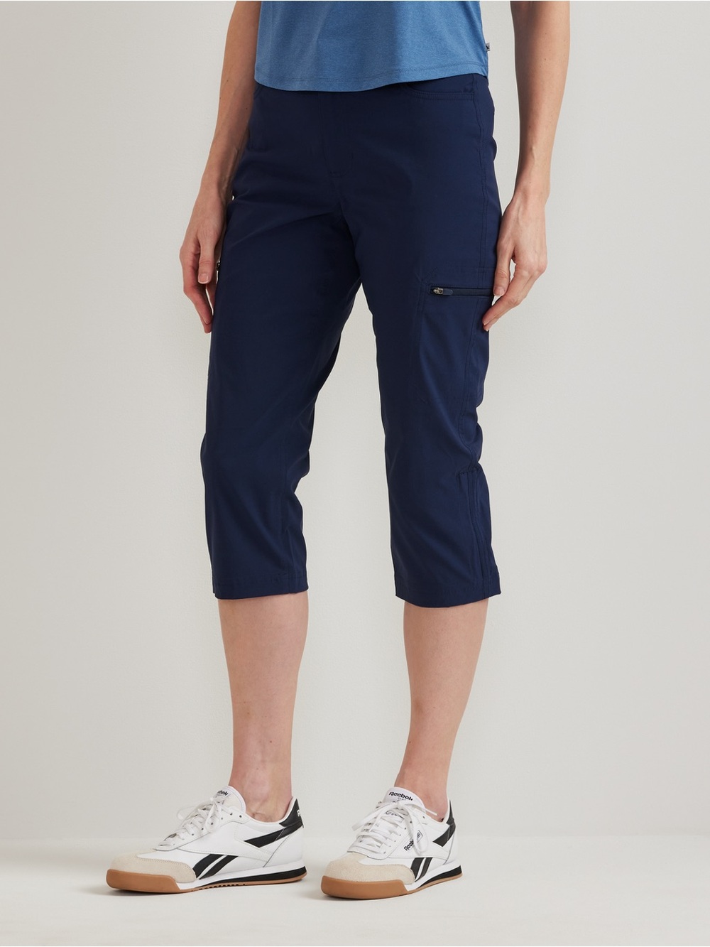 NWT Women’s Eddie Bauer Tech Capri Pants Size 12. Navy Blue